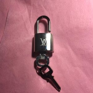 Louis Vuitton lock and key!! Fantastic condition!